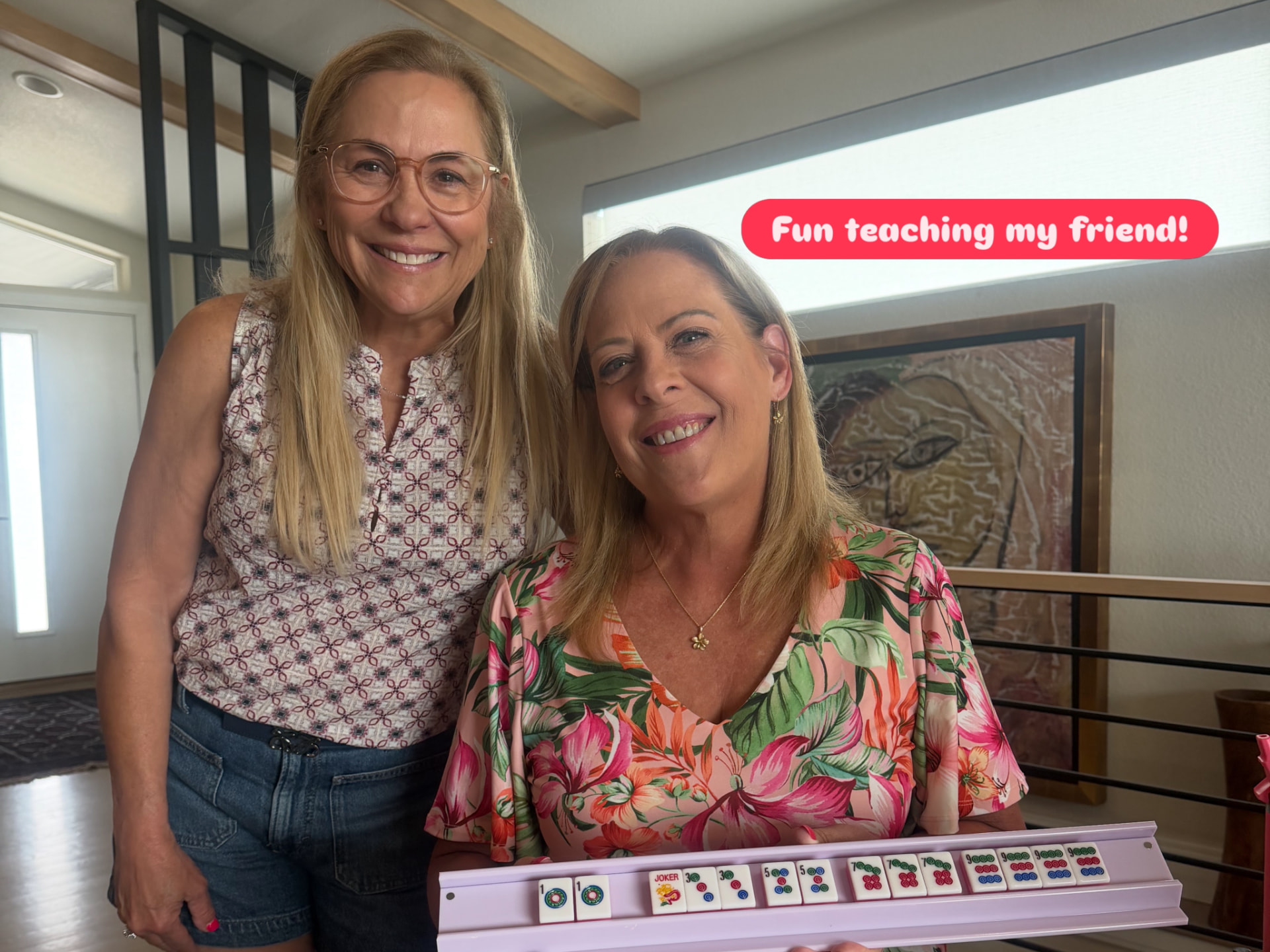 Amy teaching a friend how to play Mahjong